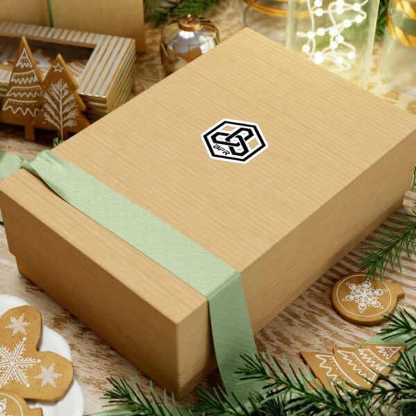 A Christmas gift box featuring a festive Christmas tree and delectable gingerbread cookies, adorned with BFR Hex Logo - Vinyl Die-Cut Stickers.