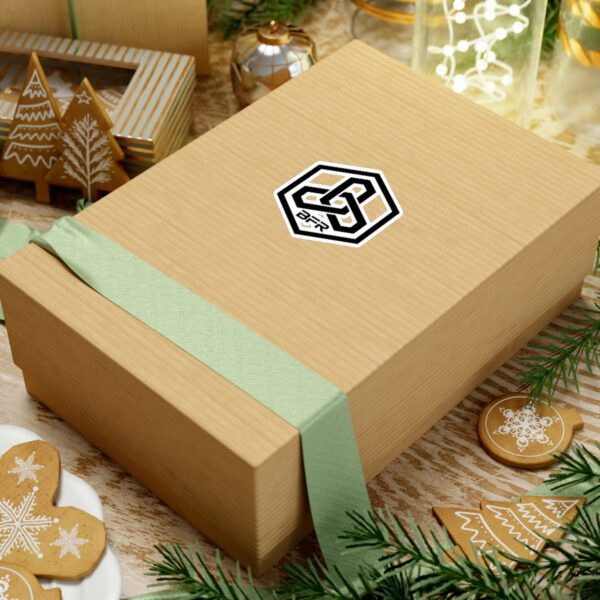 A Christmas gift box filled with the BFR Hex Logo - Vinyl Die-Cut Stickers alongside a festive Christmas tree and delightful gingerbread cookies.