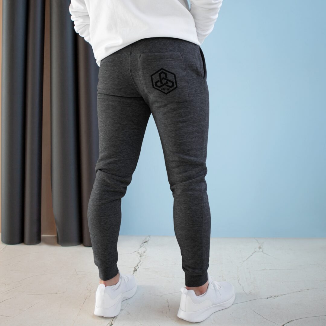 The back of a man wearing black BFR Logo - Women's Premium Fleece Joggers and a white shirt.
