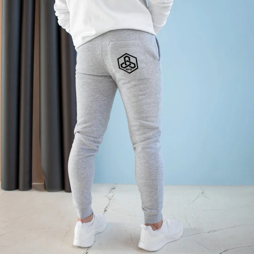 The back of a man wearing grey BFR Logo - Women's Premium Fleece Joggers showcasing the BFR Logo.