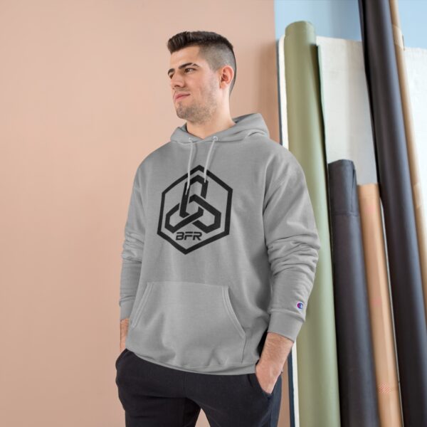 A man wearing a BFR Hex Logo - Champion Hoodie.