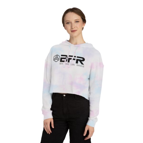 A woman wearing a BFR Logo - Women’s Cropped Hooded Sweatshirt hoodie.