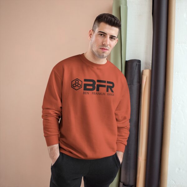 A man wearing a BFR Logo - Champion Sweatshirt.