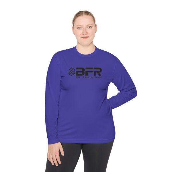 A woman wearing a purple BFR Logo - Unisex Lightweight Long Sleeve Tee.