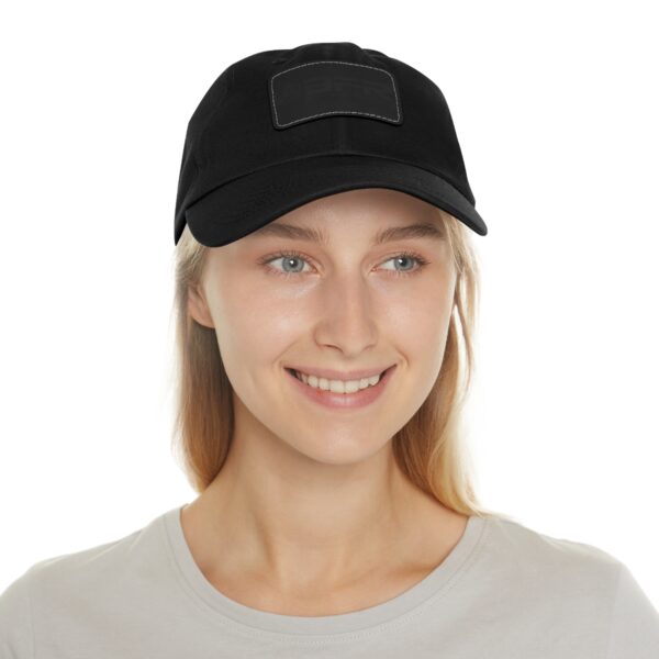 A woman wearing a BFR Logo - Dad Hat with Leather Patch (Rectangle).