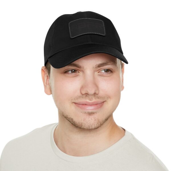 A man wearing a BFR Logo - Dad Hat with Leather Patch (Rectangle) and white t - shirt.