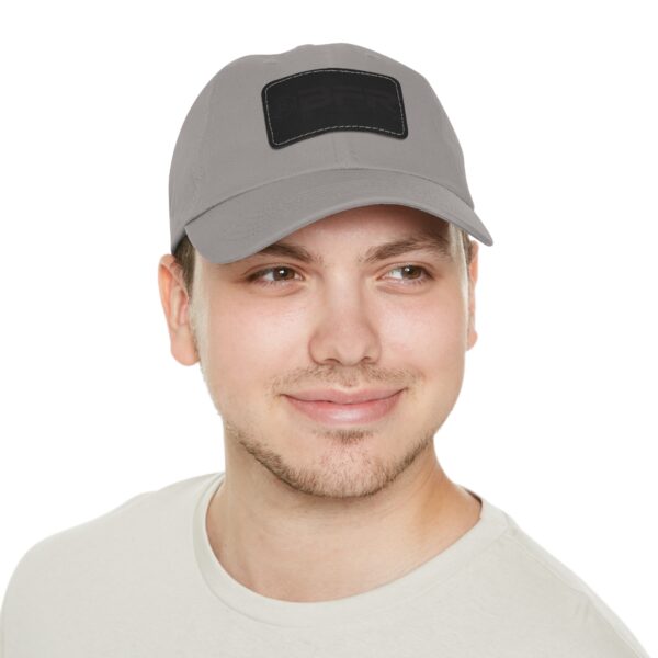 A man wearing a BFR Logo - Dad Hat with Leather Patch (Rectangle).