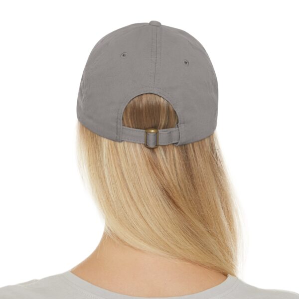 The back view of a woman wearing a BFR Logo - Dad Hat with Leather Patch (Rectangle).