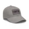 A gray BFR Logo - Dad Hat with Leather Patch (Rectangle) with the word bfr on it.