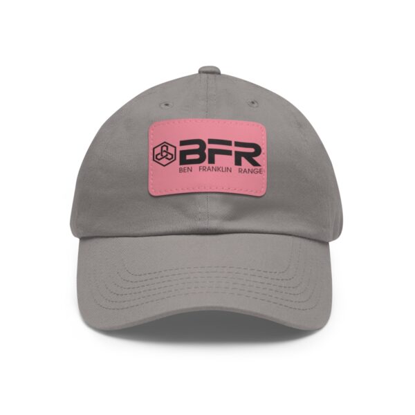 The BFR Logo - Dad Hat with Leather Patch (Rectangle) on a gray hat with a pink patch.