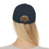 The back view of a woman wearing a BFR Logo - Dad Hat with Leather Patch (Rectangle) baseball cap.