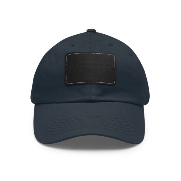 A BFR Logo - Dad Hat with Leather Patch (Rectangle) with a black patch on it.