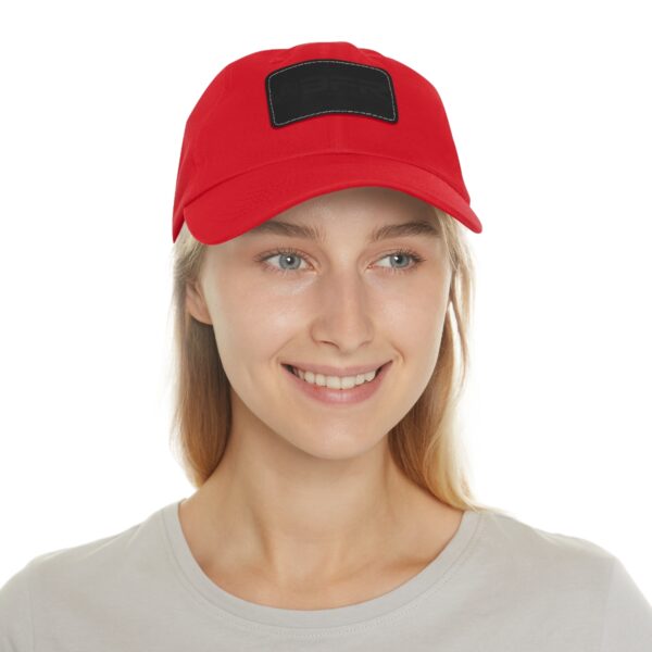 A woman wearing a BFR Logo - Dad Hat with Leather Patch (Rectangle)