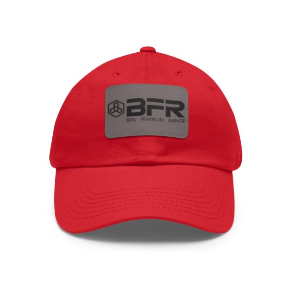 The BFR Logo - Dad Hat with Leather Patch (Rectangle) on a red hat.