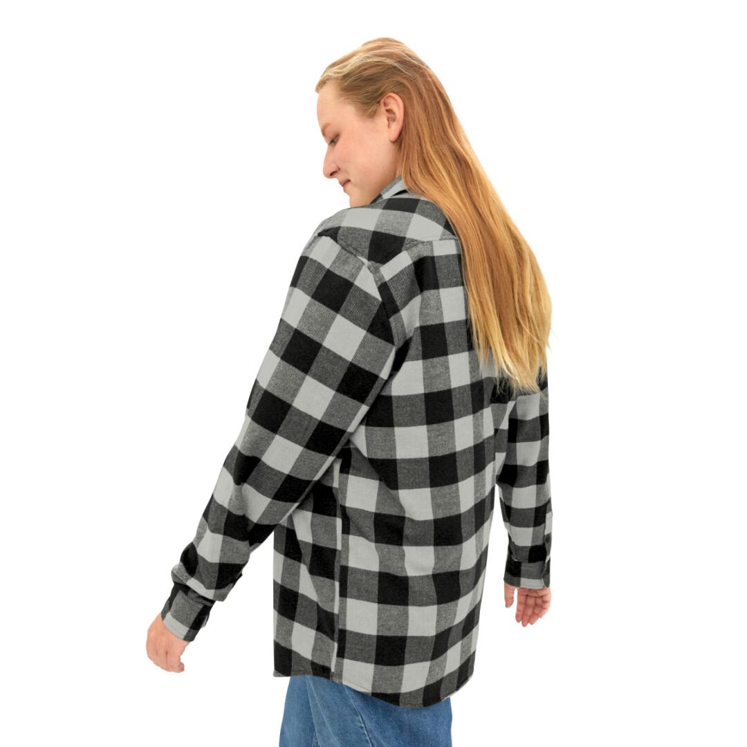 A woman wearing a BFR Logo - Unisex Flannel Shirt. A woman wearing a BFR Logo - Unisex Flannel Shirt.