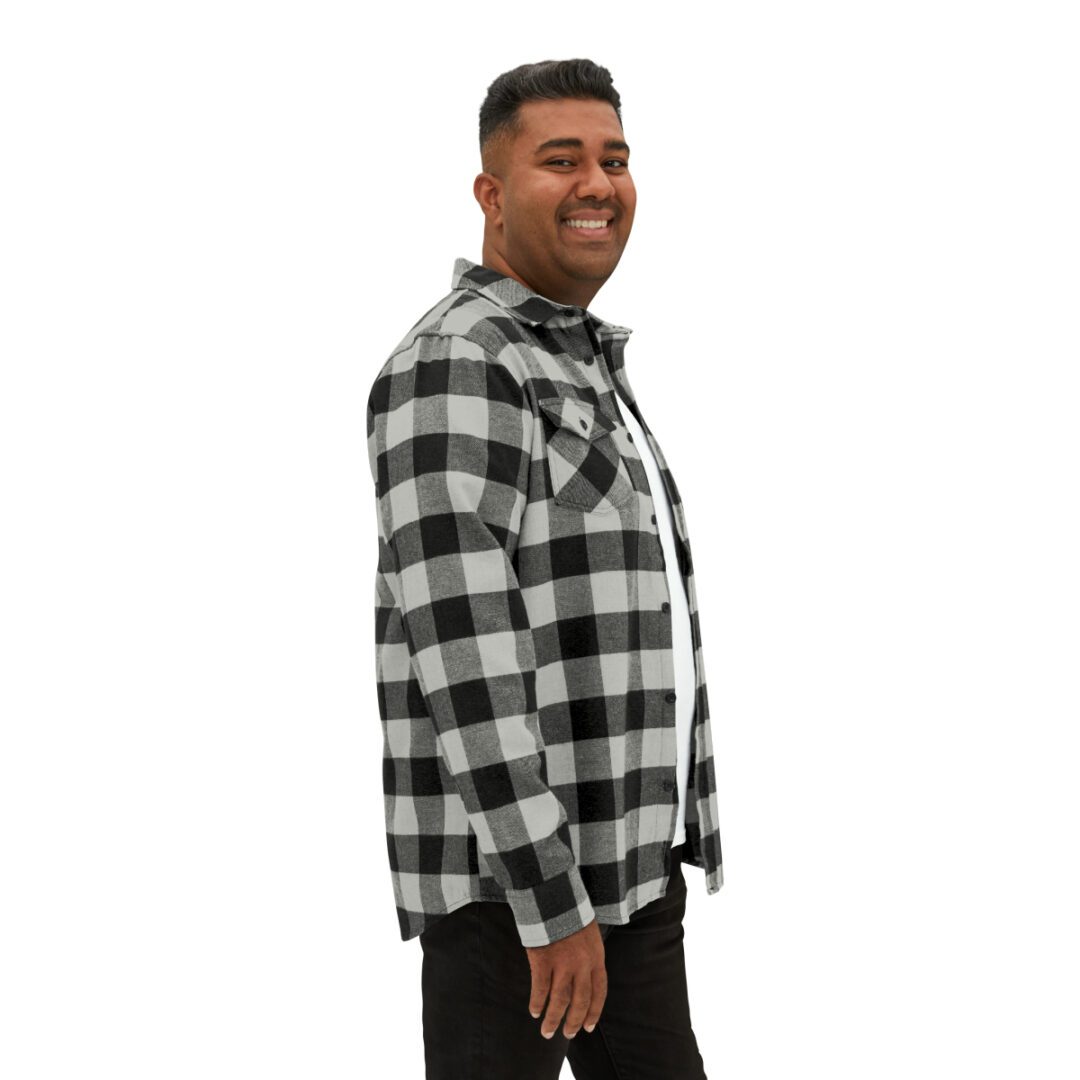 A man wearing a BFR Logo - Unisex Flannel Shirt. A man wearing a BFR Logo - Unisex Flannel Shirt.
