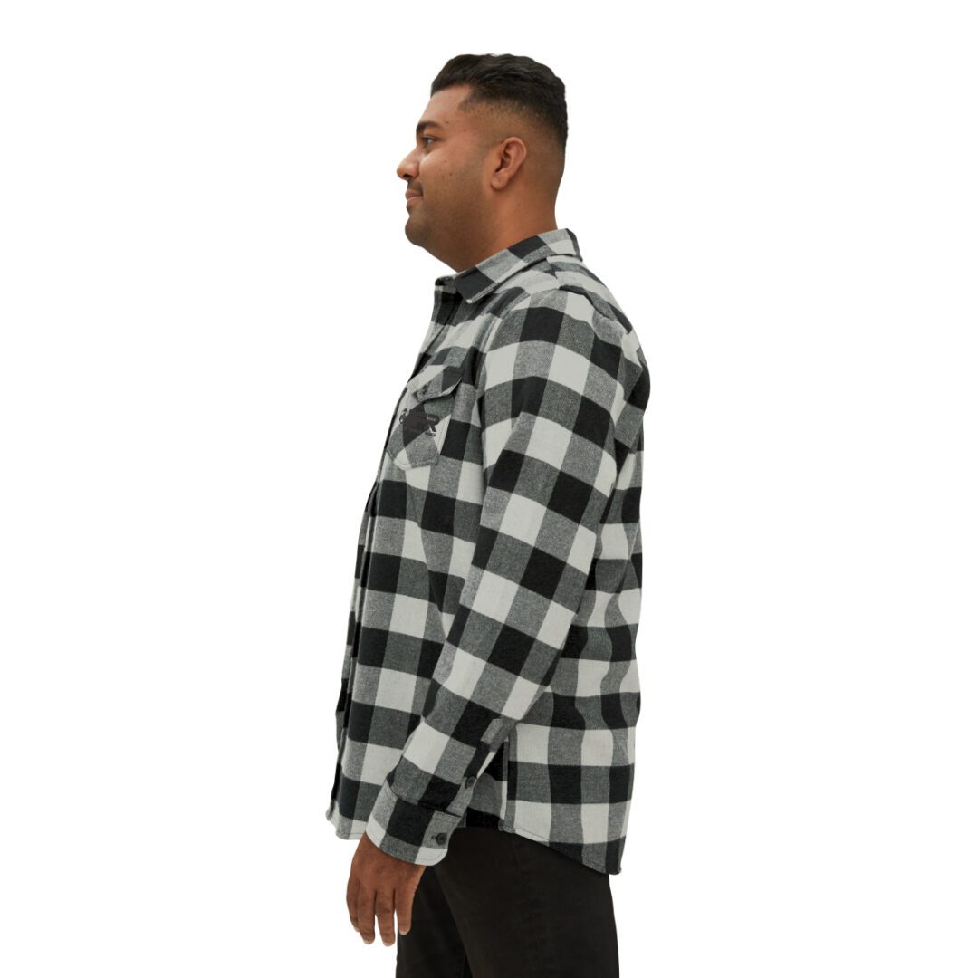 A man wearing a BFR Logo - Unisex Flannel Shirt. A man wearing a BFR Logo - Unisex Flannel Shirt.
