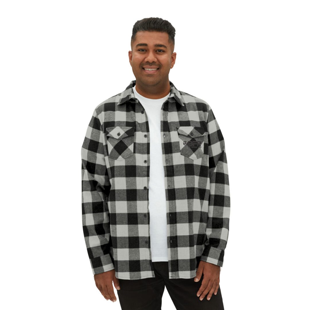 A man wearing a BFR Logo - Unisex Flannel Shirt. A man wearing a BFR Logo - Unisex Flannel Shirt.