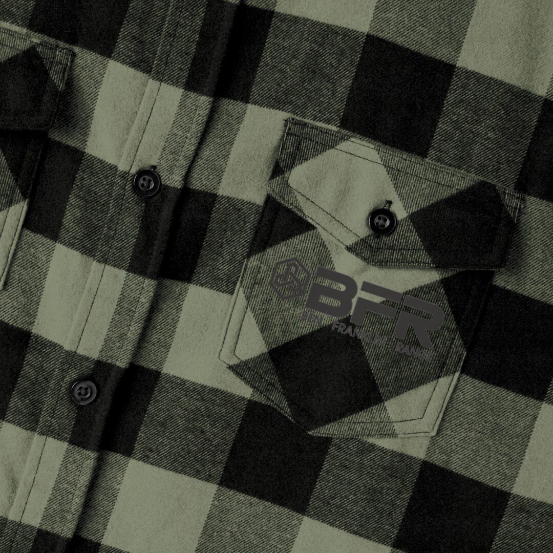 A BFR Logo - Unisex Flannel Shirt with a black and green checkered pattern. A BFR Logo - Unisex Flannel Shirt with a black and green checkered pattern.