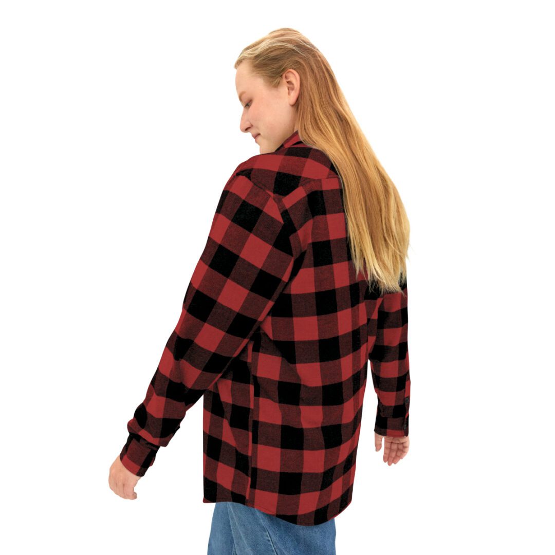 A woman wearing a BFR Logo - Unisex Flannel Shirt in red and black plaid. A woman wearing a BFR Logo - Unisex Flannel Shirt in red and black plaid.