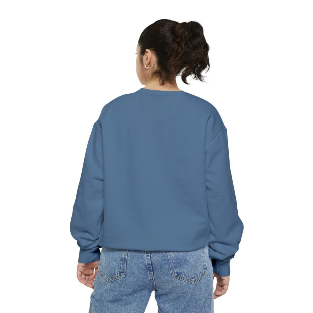 The back view of a woman wearing a BFR Logo - Unisex Garment-Dyed Sweatshirt.