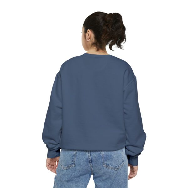 The back view of a woman wearing a BFR Logo - Unisex Garment-Dyed Sweatshirt.