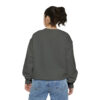 The back view of a woman wearing a BFR Logo - Unisex Garment-Dyed Sweatshirt and jeans.