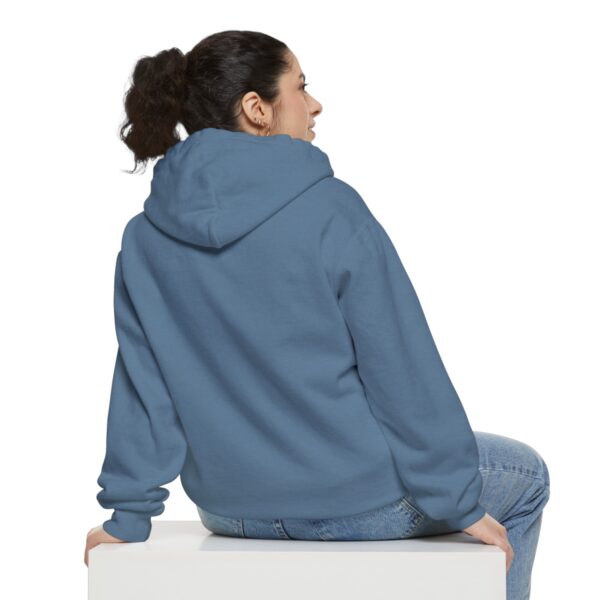 The back of a woman wearing a BFR Logo - Unisex Garment-Dyed Hoodie.