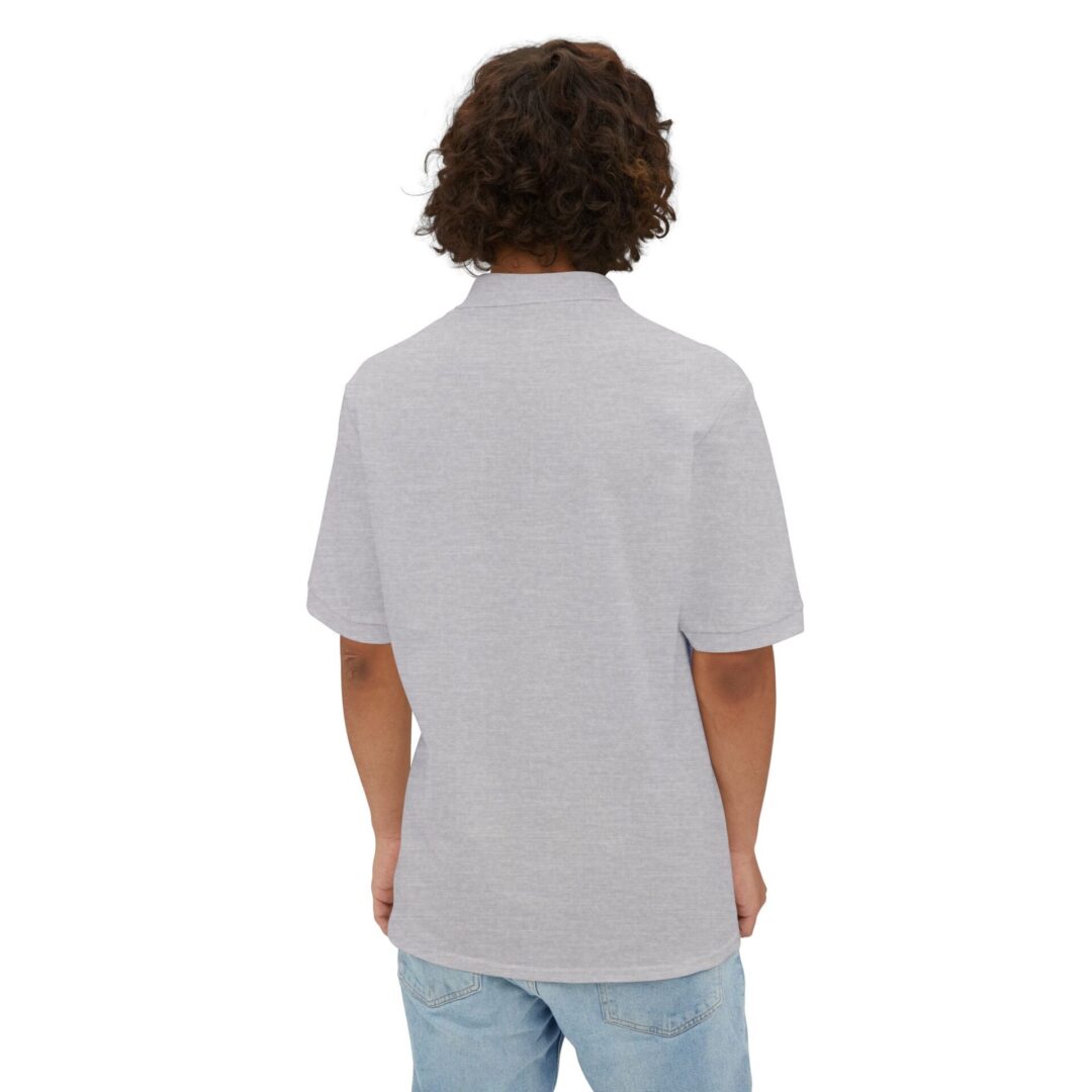 Back view of person in gray shirt.