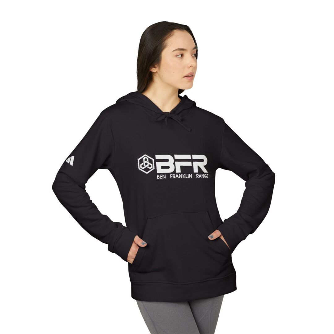 Person wearing black BFR hoodie, looking sideways.