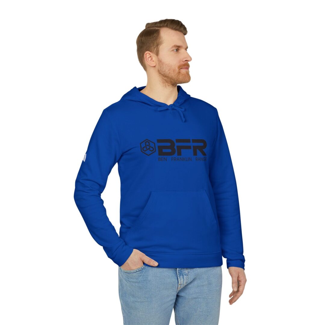 Man wearing blue BFR hoodie, looking sideways.
