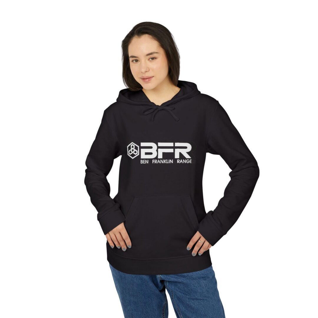 Woman wearing black hoodie with printed logo.