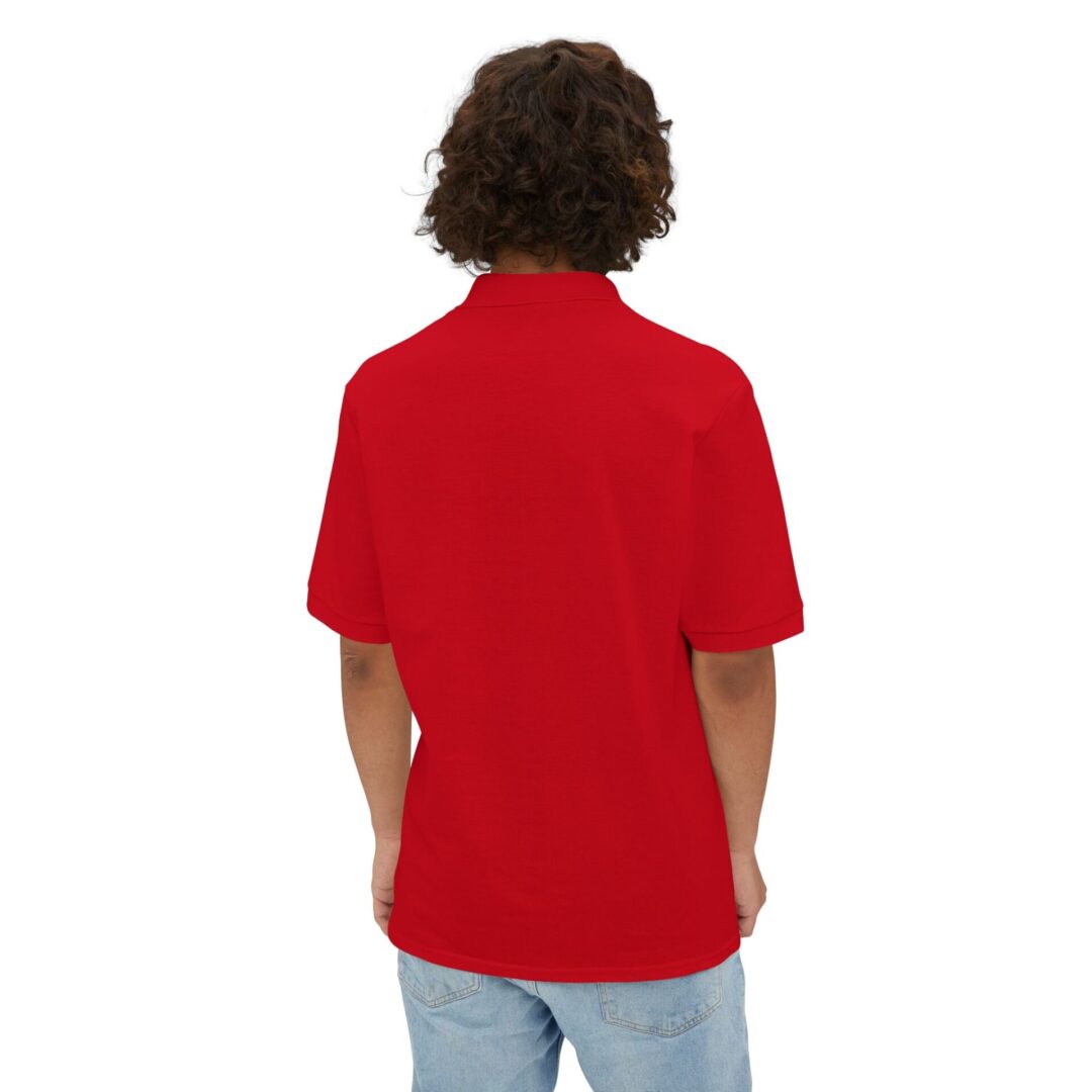 Person wearing red shirt, facing away.