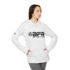 Woman wearing white BFR hoodie, hands on hips.
