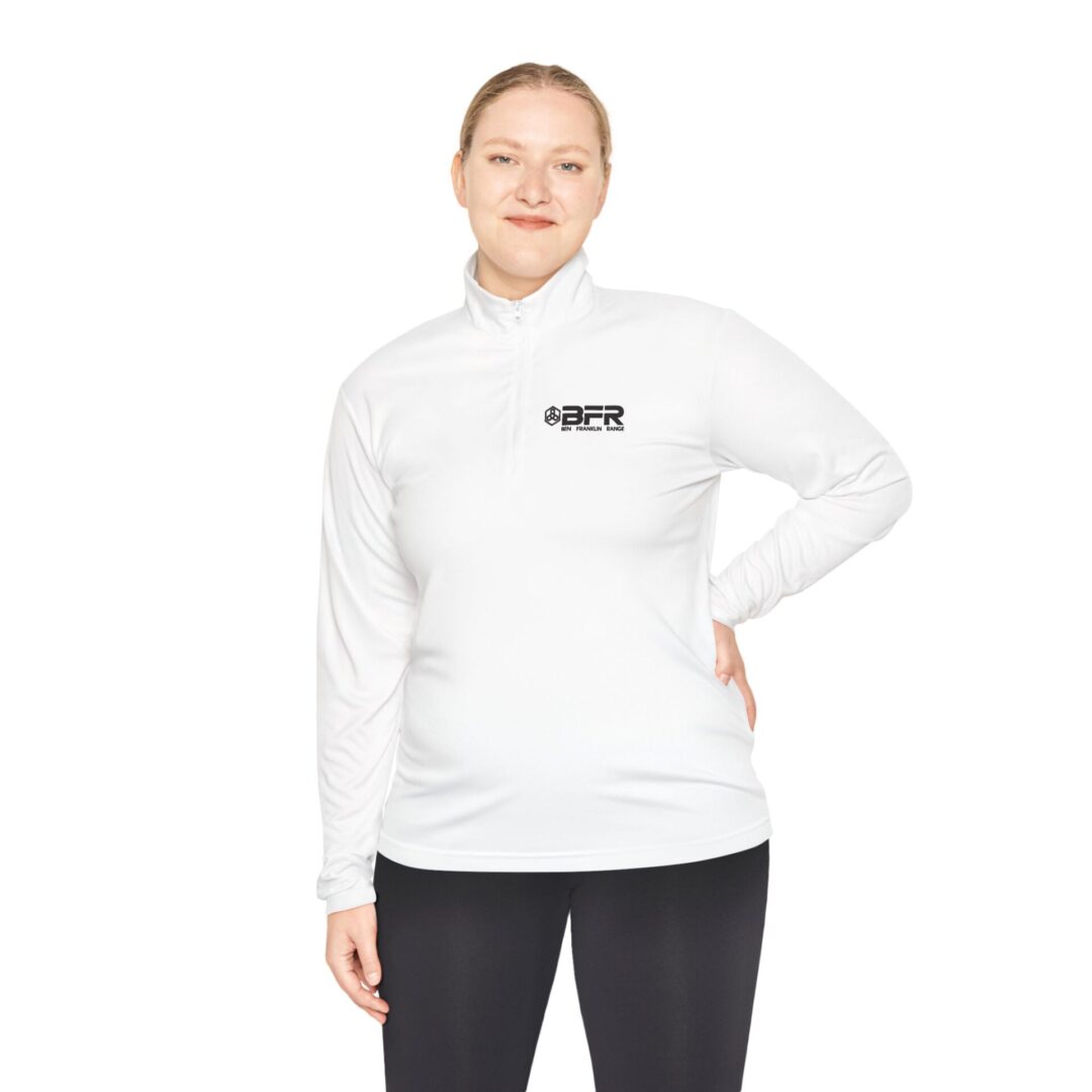 Woman in white BFR quarter-zip shirt.
