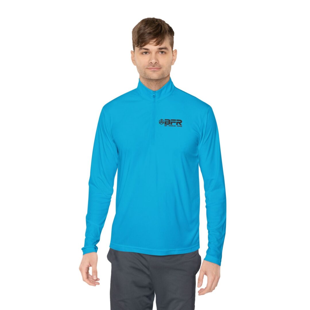 Man in blue long-sleeve shirt.