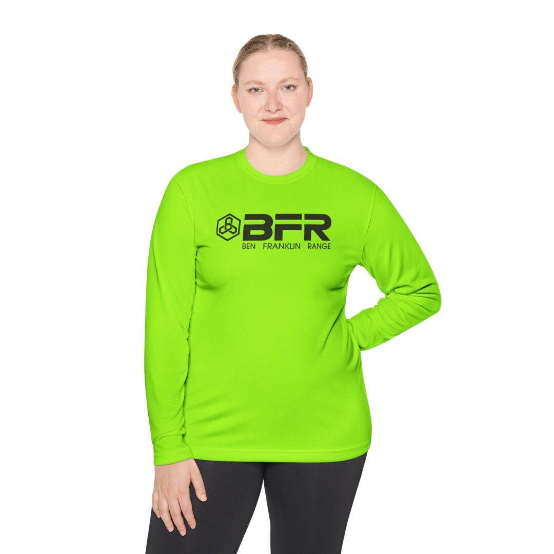 Person in green Ben Franklin Range shirt.