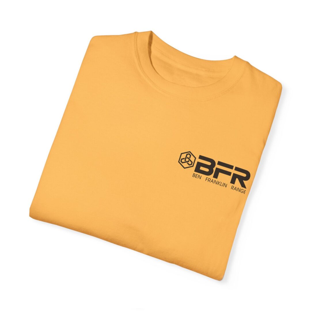 Folded yellow T-shirt with BFR logo. Folded yellow T-shirt with BFR logo.