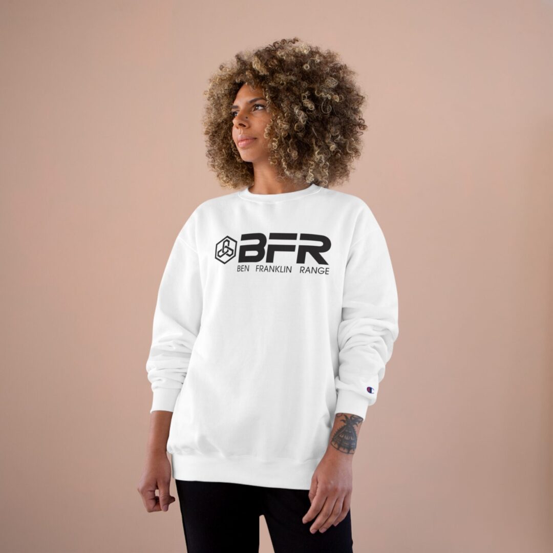 Person wearing BFR sweatshirt, neutral background. Person wearing BFR sweatshirt, neutral background.