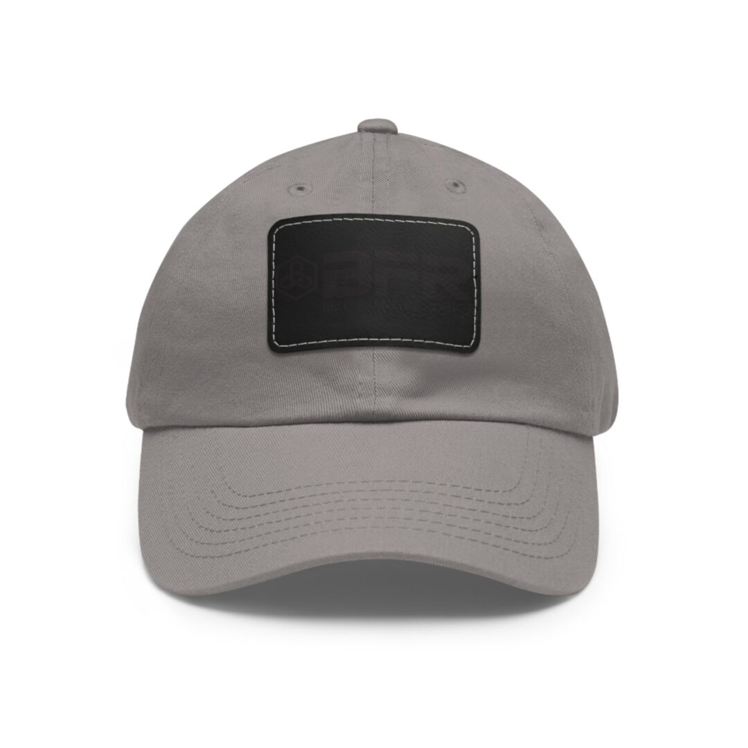 Gray baseball cap with black patch.
