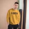 Man wearing mustard BFR sweatshirt indoors. Man wearing mustard BFR sweatshirt indoors.