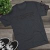 Gray BFR t-shirt on wooden surface.