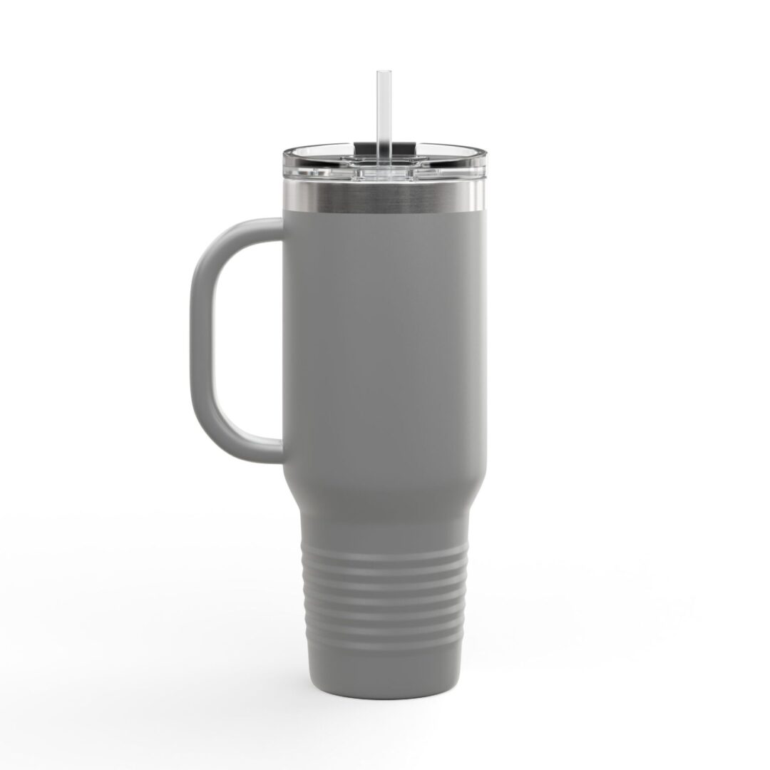 Gray insulated tumbler with a handle.