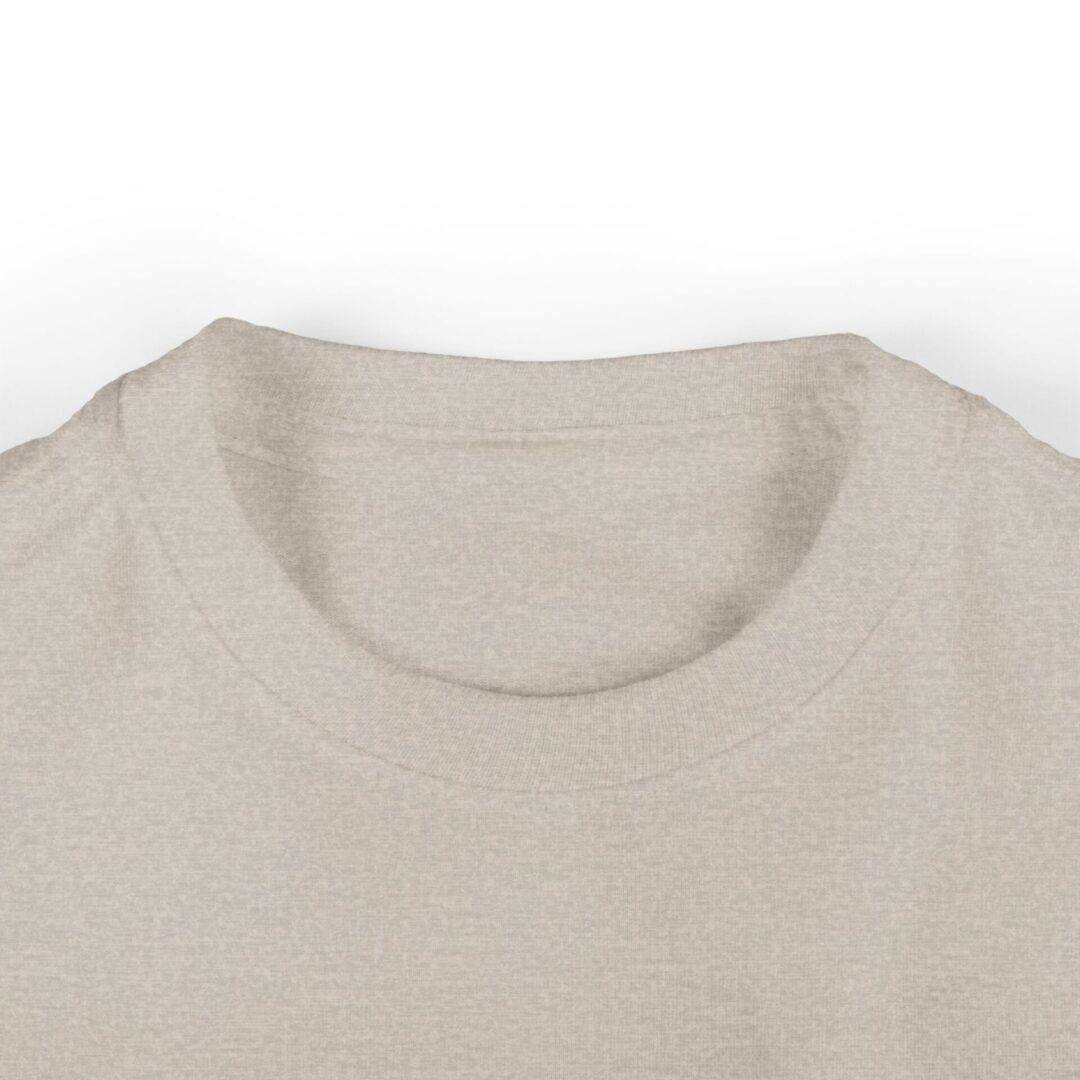 Beige T-shirt neckline close-up view.