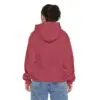 Child in red hoodie and jeans, back view.