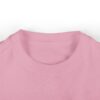 Pink t-shirt collar, close-up view.